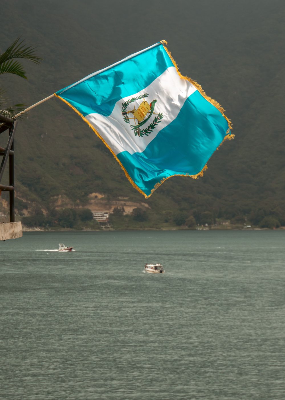 Guatemalan flag flying above Lake Atitlán